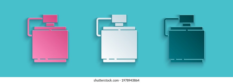 Paper cut Canteen water bottle icon isolated on blue background. Tourist flask icon. Jar of water use in the campaign. Paper art style. Vector