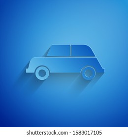 Paper cut Car icon isolated on blue background. Paper art style. Vector Illustration
