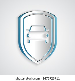 Paper cut Car protection or insurance icon isolated on grey background. Protect car guard shield. Safety badge vehicle icon. Security auto label. Paper art style. Vector Illustration