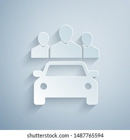 Paper cut Car sharing with group of people icon isolated on grey background. Carsharing sign. Transport renting service concept. Paper art style. Vector Illustration