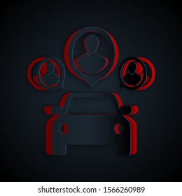 Paper cut Car sharing with group of people icon isolated on black background. Carsharing sign. Transport renting service concept. Paper art style. Vector Illustration