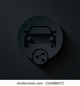 Paper cut Car sharing icon isolated on black background. Carsharing sign. Transport renting service concept. Paper art style. Vector Illustration