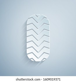 Paper cut Car tire icon isolated on grey background. Paper art style. Vector Illustration