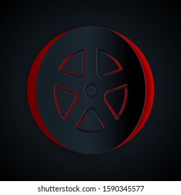 Paper cut Car wheel icon isolated on black background. Paper art style. Vector Illustration