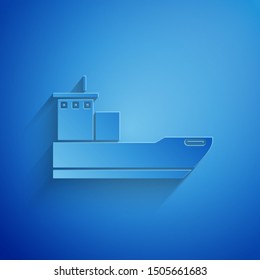 Paper cut Cargo ship icon isolated on blue background. Paper art style. Vector Illustration