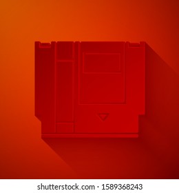 Paper cut Cartridge for retro game console icon isolated on red background. TV Game cartridge. Paper art style. Vector Illustration