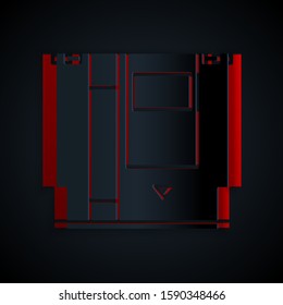 Paper cut Cartridge for retro game console icon isolated on black background. TV Game cartridge. Paper art style. Vector Illustration