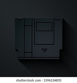Paper cut Cartridge for retro game console icon isolated on black background. TV Game cartridge. Paper art style. Vector Illustration