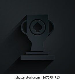 Paper cut Casino poker trophy cup icon isolated on black background. Paper art style. Vector Illustration