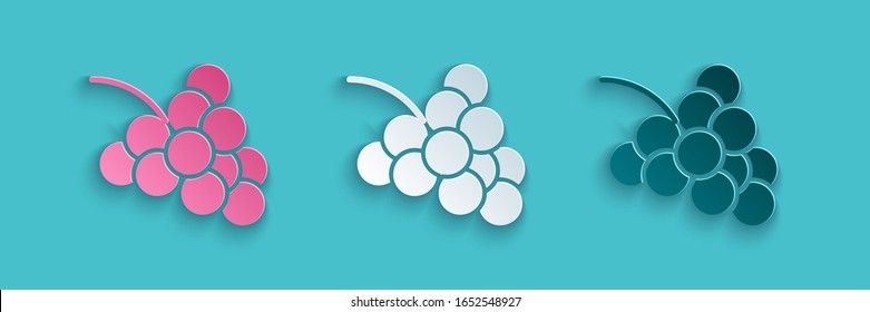 Paper cut Casino slot machine with grape symbol icon isolated on blue background. Gambling games. Paper art style. Vector Illustration