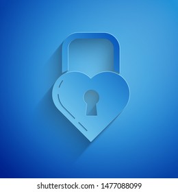 Paper cut Castle in the shape of a heart icon isolated on blue background. Locked Heart. Love symbol and keyhole sign. Paper art style. Vector Illustration