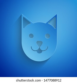 Paper cut Cat icon isolated on blue background. Paper art style. Vector Illustration