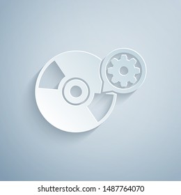 Paper cut CD or DVD disk and gear icon isolated on grey background. Adjusting app, service concept, setting options, maintenance, repair, fixing. Paper art style. Vector Illustration