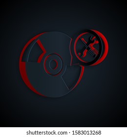 Paper cut CD or DVD disk with screwdriver and wrench icon isolated on black background. Adjusting, service, setting, maintenance, repair, fixing. Paper art style. Vector Illustration