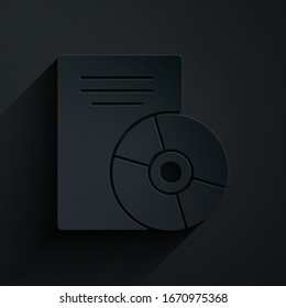 Paper cut CD or DVD disk icon isolated on black background. Compact disc sign. Paper art style. Vector Illustration
