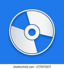 Paper cut CD or DVD disk icon isolated on blue background. Compact disc sign. Paper art style. Vector Illustration