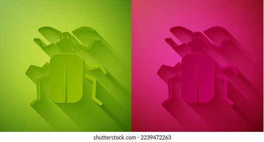 Paper cut Chafer beetle icon isolated on green and pink background. Paper art style. Vector