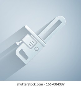 Paper cut Chainsaw icon isolated on grey background. Paper art style. Vector Illustration
