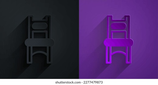 Paper cut Chair icon isolated on black on purple background. Paper art style. Vector