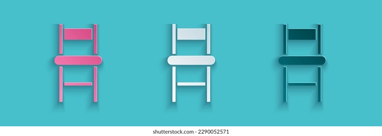 Paper cut Chair icon isolated on blue background. Paper art style. Vector Illustration