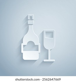 Paper cut Champagne bottle with glass icon isolated on grey background. Paper art style. Vector