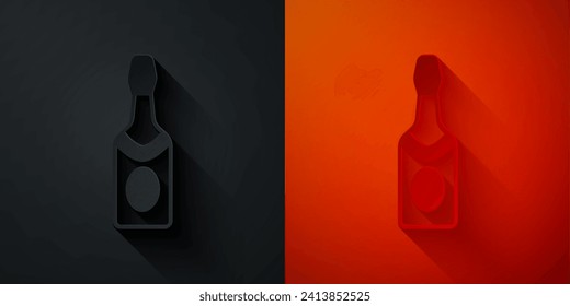 Paper cut Champagne bottle icon isolated on black and red background. Paper art style. Vector