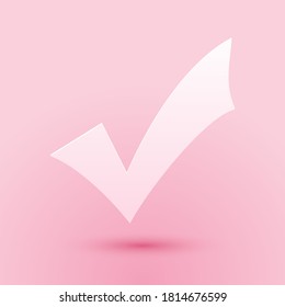 Paper cut Check mark icon isolated on pink background. Tick symbol. Paper art style. Vector.