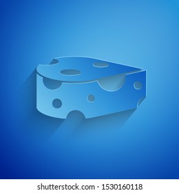Paper cut Cheese icon isolated on blue background. Paper art style. Vector Illustration