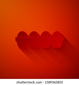 Paper cut Chicken egg in box icon isolated on red background. Paper art style. Vector Illustration