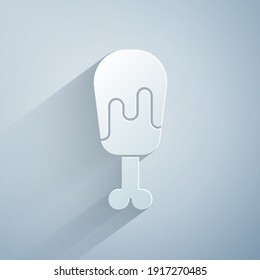 Paper cut Chicken leg icon isolated on grey background. Chicken drumstick. Paper art style. Vector