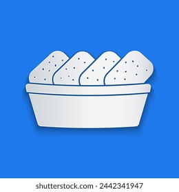 Paper cut Chicken nuggets in box icon isolated on blue background. Paper art style. Vector Illustration