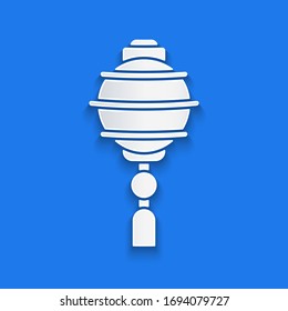 Paper cut Chinese paper lantern icon isolated on blue background. Paper art style. Vector Illustration