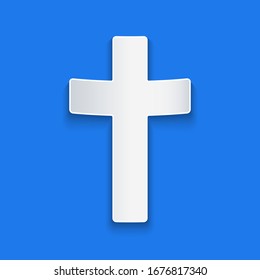 Paper cut Christian cross icon isolated on blue background. Church cross. Paper art style. Vector Illustration