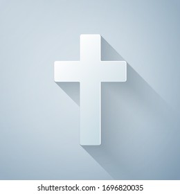 Paper cut Christian cross icon isolated on grey background. Church cross. Paper art style. Vector Illustration