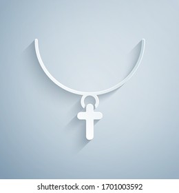 Paper cut Christian cross on chain icon isolated on grey background. Church cross. Paper art style. Vector Illustration