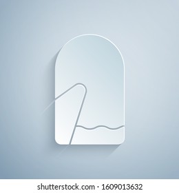 Paper cut Christmas mitten icon isolated on grey background. Paper art style. Vector Illustration