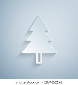 Paper cut Christmas tree icon isolated on grey background. Merry Christmas and Happy New Year. Paper art style. Vector.