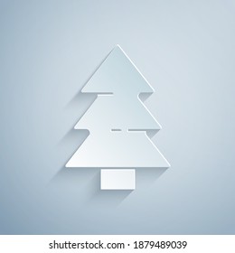 Paper cut Christmas tree icon isolated on grey background. Merry Christmas and Happy New Year. Paper art style. Vector.