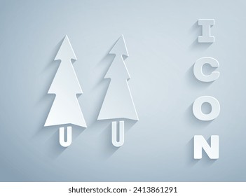Paper cut Christmas tree icon isolated on grey background. Merry Christmas and Happy New Year. Paper art style. Vector