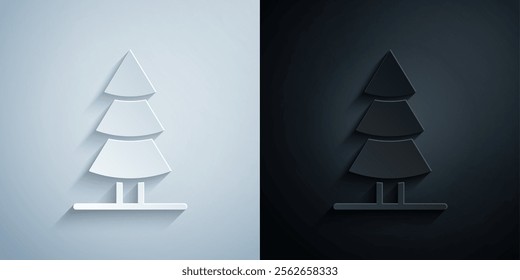 Paper cut Christmas tree icon isolated on grey and black background. Merry Christmas and Happy New Year. Paper art style. Vector