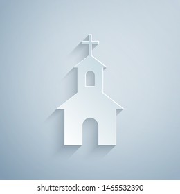 Paper cut Church building icon isolated on grey background. Christian Church. Religion of church. Paper art style. Vector Illustration