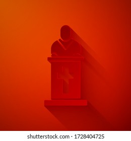 Paper cut Church pastor preaching icon isolated on red background. Paper art style. Vector Illustration