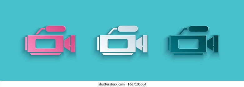 Papier schneiden Cinema Kamera Symbol einzeln auf blauem Hintergrund. Videokamera. Filmzeichen. Filmprojektor. Kunststil aus Papier. Vektorillustration-Illustration