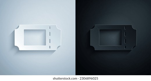 Paper cut Cinema ticket icon isolated on grey and black background. Paper art style. Vector