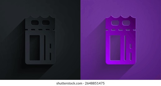 Paper cut Cinema ticket icon isolated on black on purple background. Paper art style. Vector