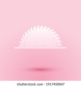 Paper cut Circular saw blade icon isolated on pink background. Saw wheel. Paper art style. Vector.
