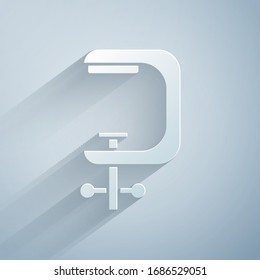 Paper cut Clamp and screw tool icon isolated on grey background. Locksmith tool. Paper art style. Vector Illustration