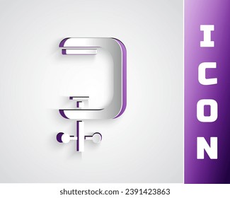 Paper cut Clamp and screw tool icon isolated on grey background. Locksmith tool. Paper art style. Vector Illustration