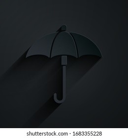 Paper cut Classic elegant opened umbrella icon isolated on black background. Rain protection symbol. Paper art style. Vector Illustration