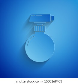 Paper cut Cleaning spray bottle with detergent liquid icon isolated on blue background. Paper art style. Vector Illustration